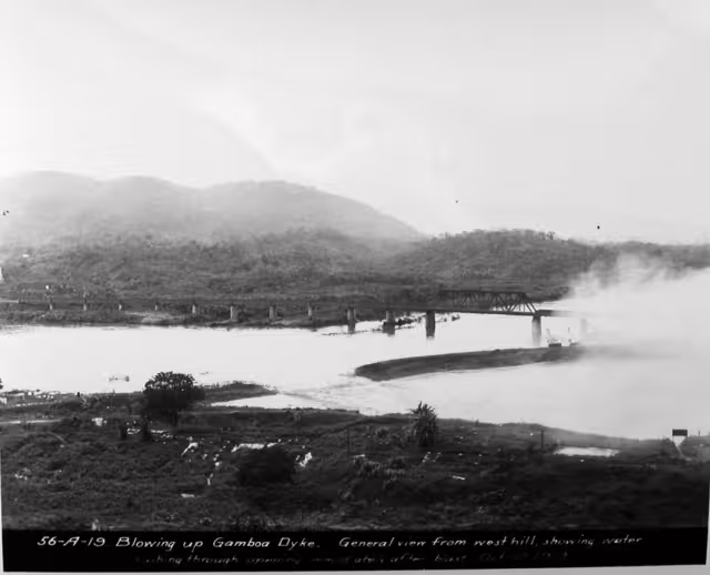 Water rushes through the breached Gamboa Dike immediately after the blast on October 10, 1913, connecting Gatun Lake with the Culebra Cut during construction of the Panama Canal.
