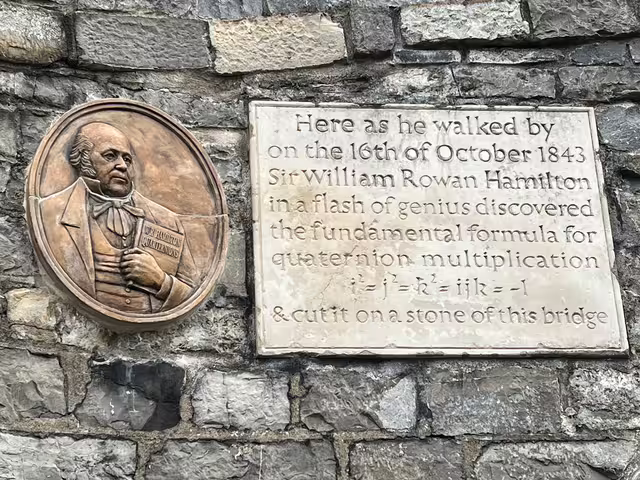 Commemorative plaque on Broom Bridge in Dublin, marking William Rowan Hamilton’s discovery of quaternions on October 16, 1843. Photographed in July 2022.