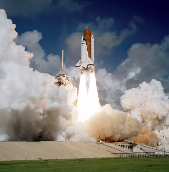 Space shuttle Atlantis lifts off from Kennedy Space Center in Florida on 3 October 1985, beginning its maiden mission, STS-51-J.