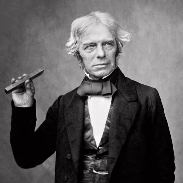 Michael Faraday holding a glass bar