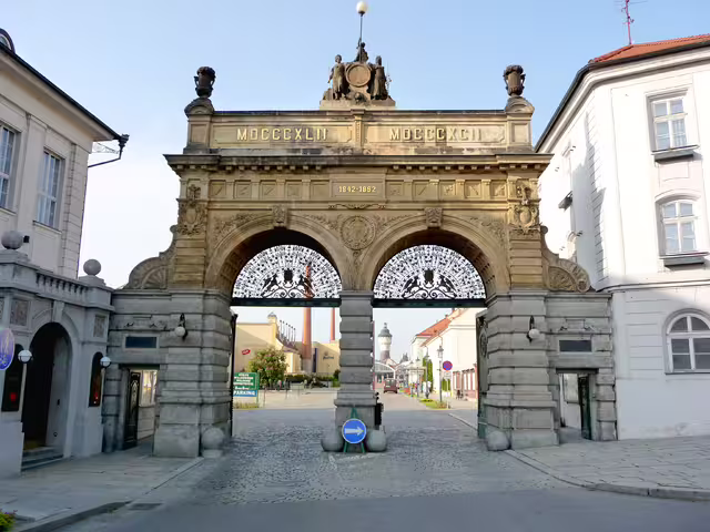 The Jubilee Gate of the Pilsner Urquell brewery in Plzeň, photographed in 2008. Built in 1892, the gate commemorates the brewery’s fiftieth anniversary.