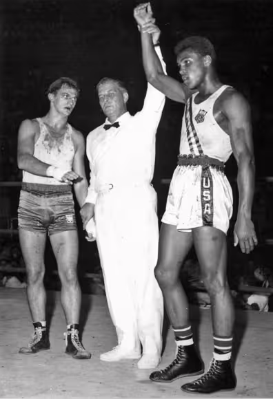 Cassius Clay (later Muhammad Ali) and Zbigniew Pietrzykowski at the 1960 Rome Olympics